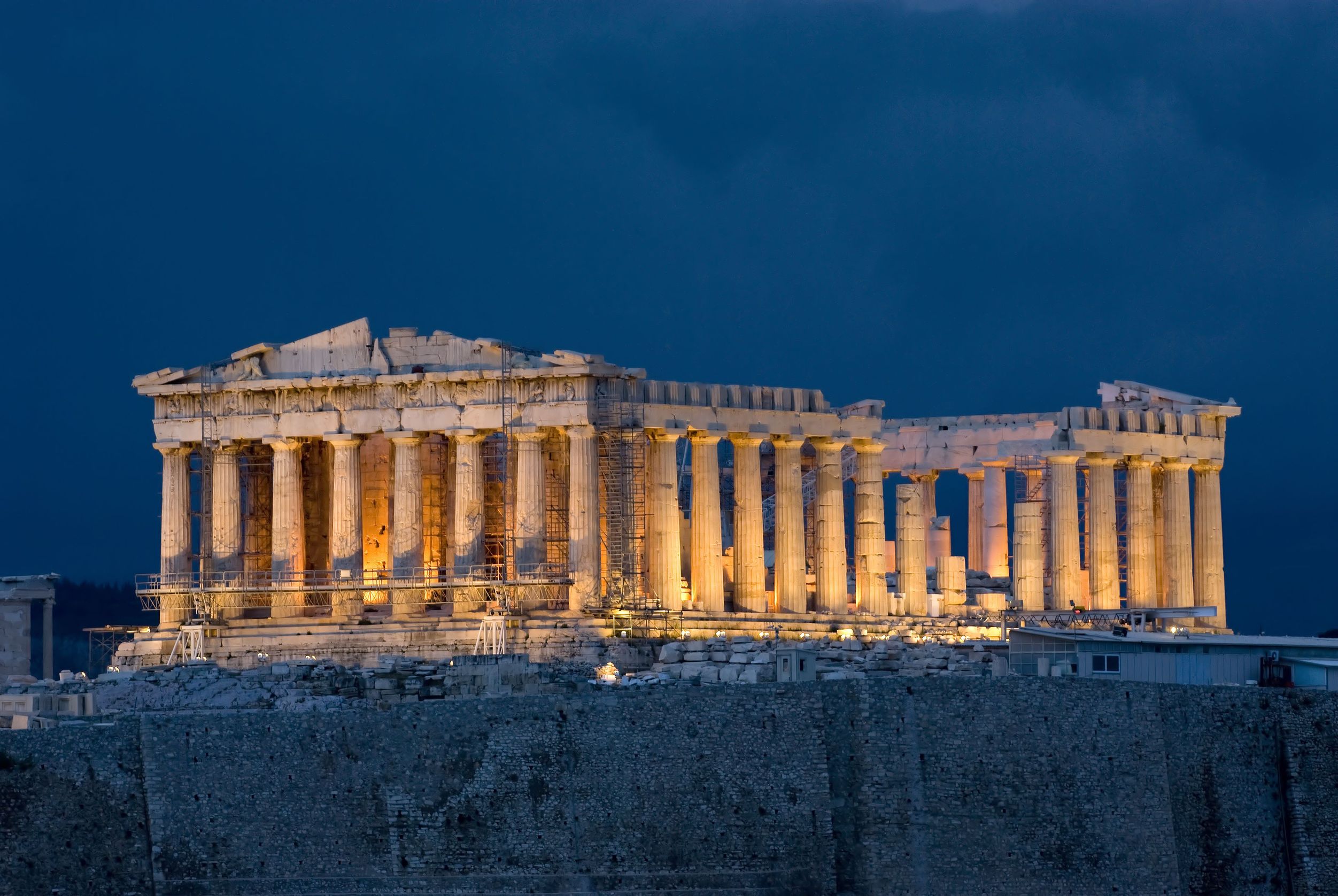Evening view of the brightly lit Parthenon.